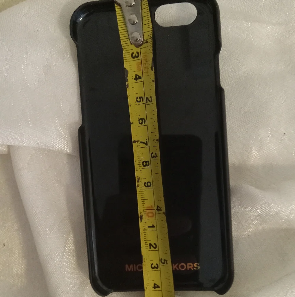 Michael Kors gold glitter white black Apple I phone 6 case.